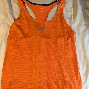 Flowy full length Nike orange top. Has so fraying that was there when purchased